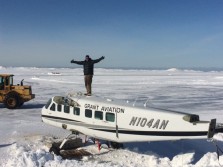 A Person On Top Of A White Aircraft
